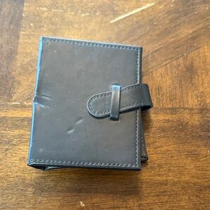 Wallet size photo holder does show some wear otherwise in good condition